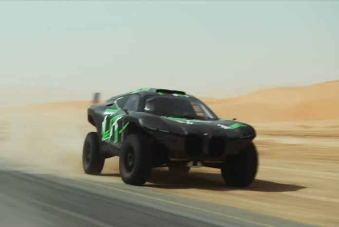 The BMW Dune Taxi 4x4 prototype blazes off in a Mad Max-esque video trailer Coasting along on the Tal Moreeb sand dunes of Abu Dhabi is the BMW Dune Taxi 4x4 prototype as shown in a new promotional video released by BMW Middle East. Considered as some of the tallest dunes reaching over 300 meters, the new prototype by the German luxury automaker sure looks like a whole lot of fun to drive on the sandy, dusty terrain. The slogan 